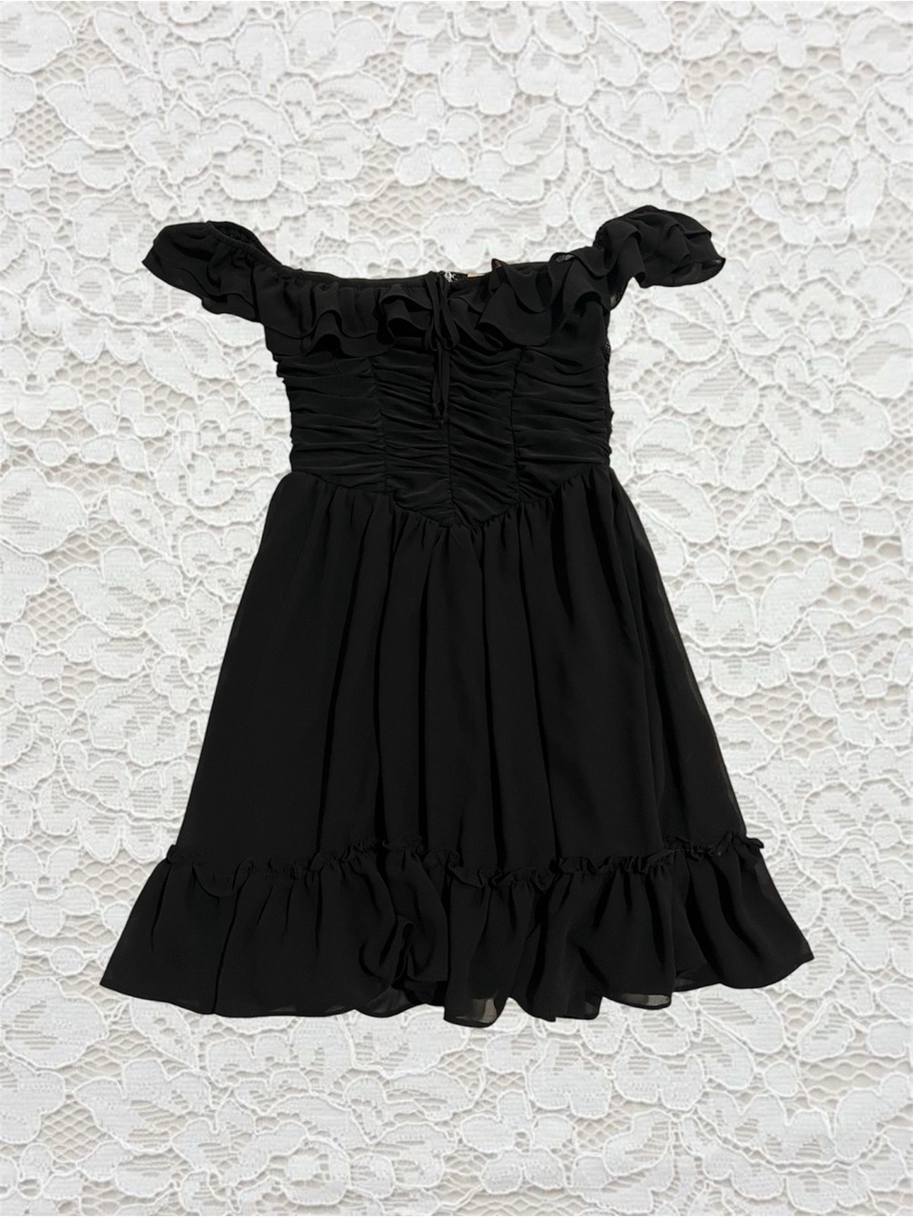 black off the shoulder mini dress with ruffles